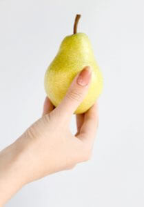 Hand with pear